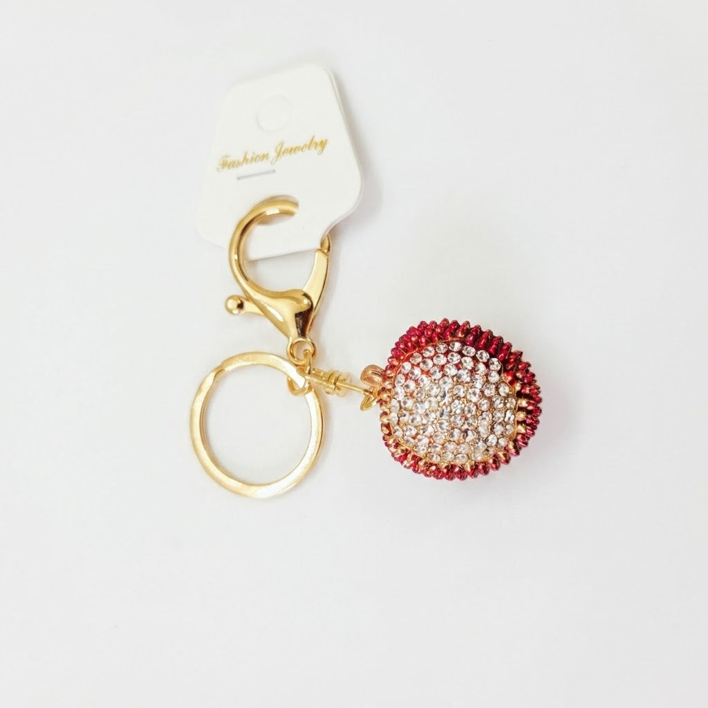 Crystal-embellished fruit charms.