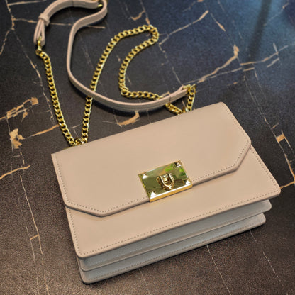 Chic Metallic Lock Crossbody Bag
Product Overview
