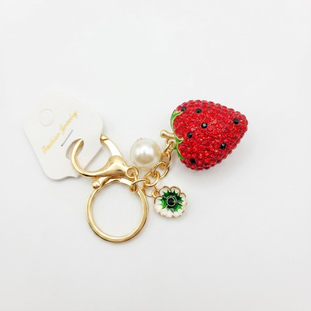 Crystal-embellished fruit charms.