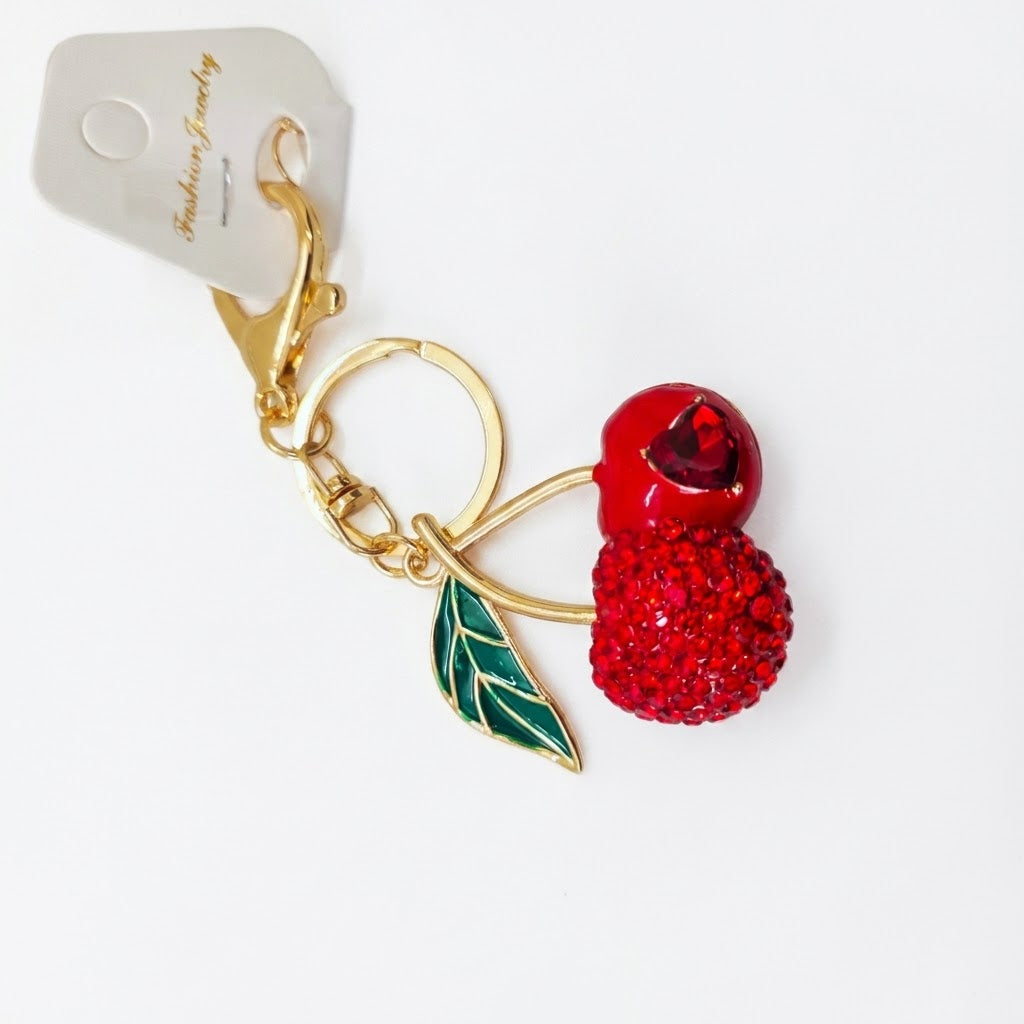 Crystal-embellished fruit charms.