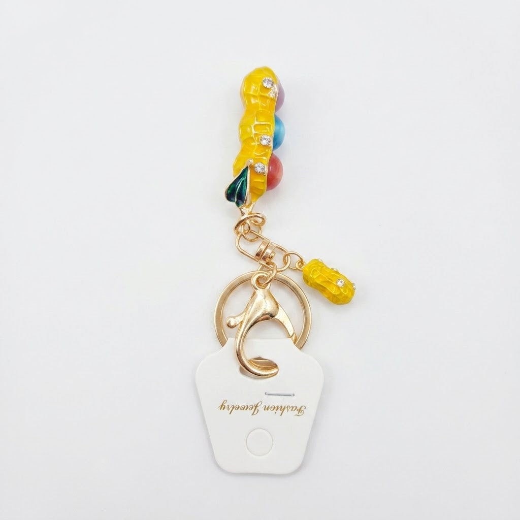 Crystal-embellished fruit charms.