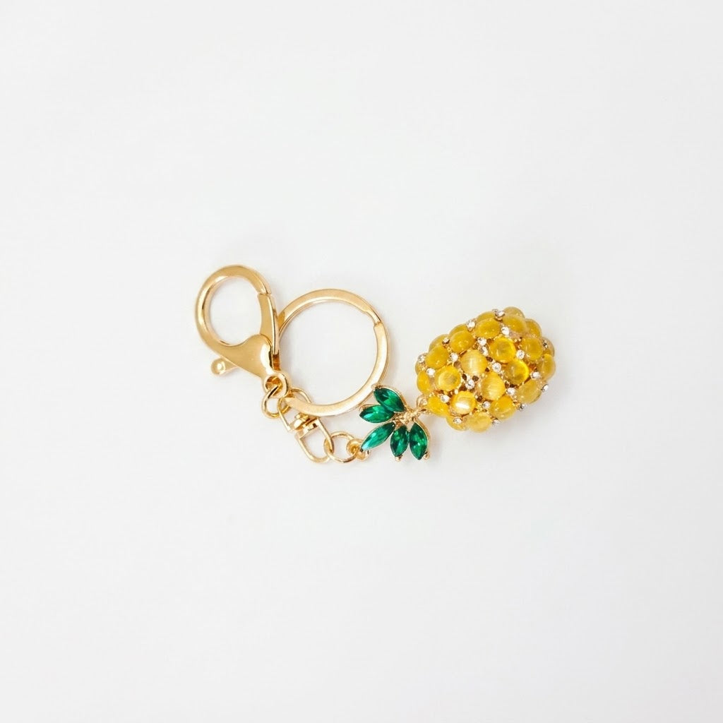 Crystal-embellished fruit charms.