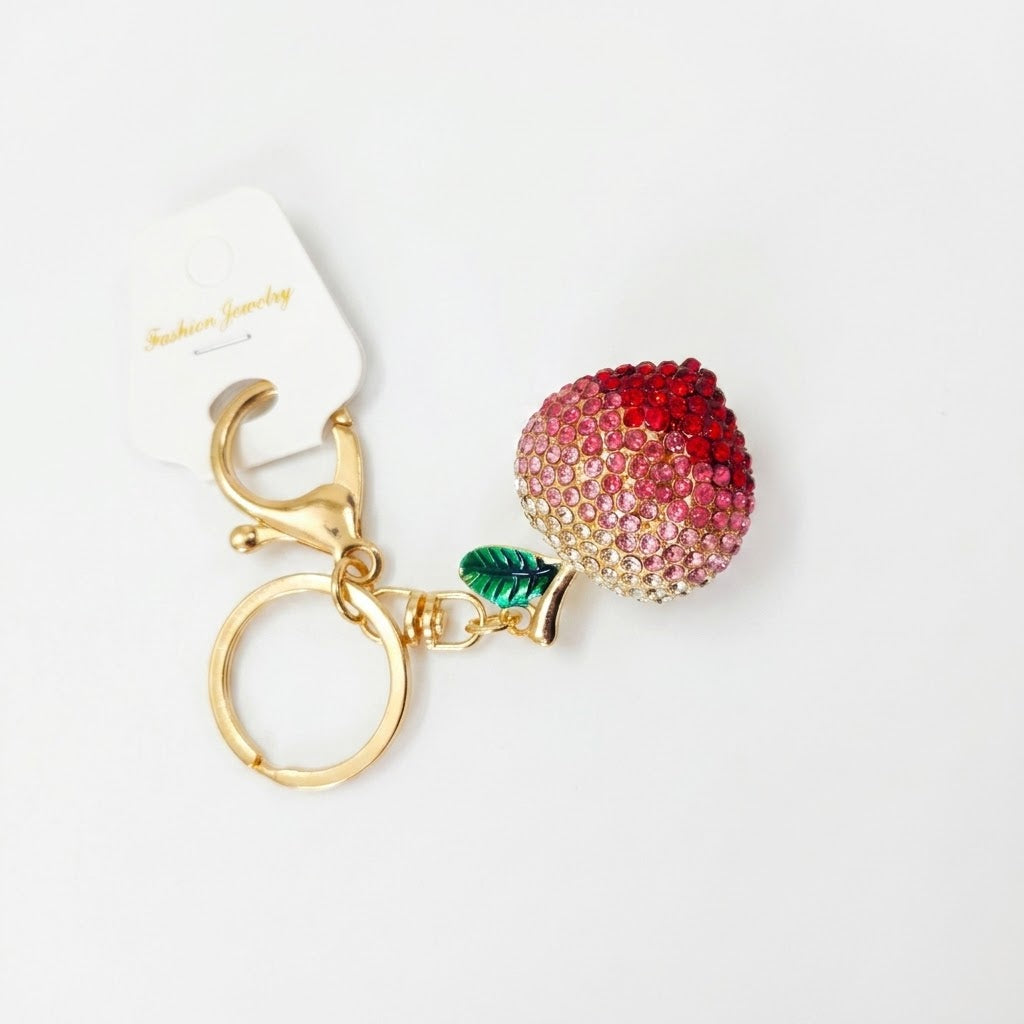 Crystal-embellished fruit charms.