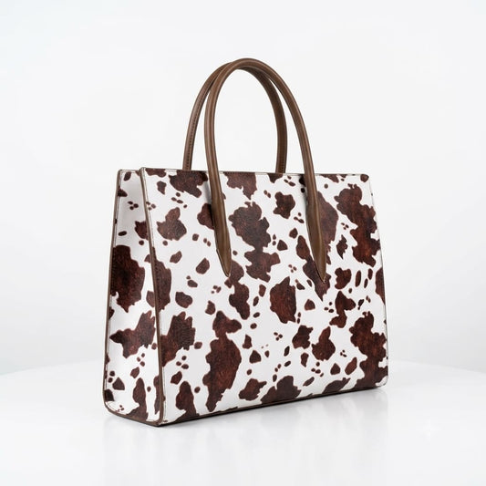 Work, Travel & Turn Heads with Our Cow-Print Tote Bags!