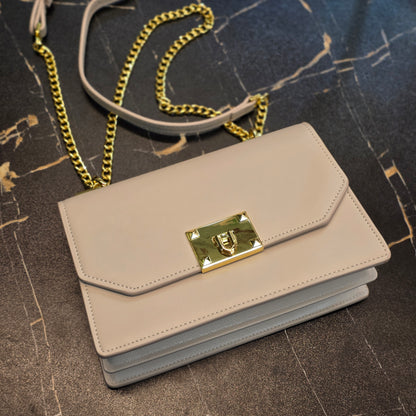 Chic Metallic Lock Crossbody Bag
Product Overview
