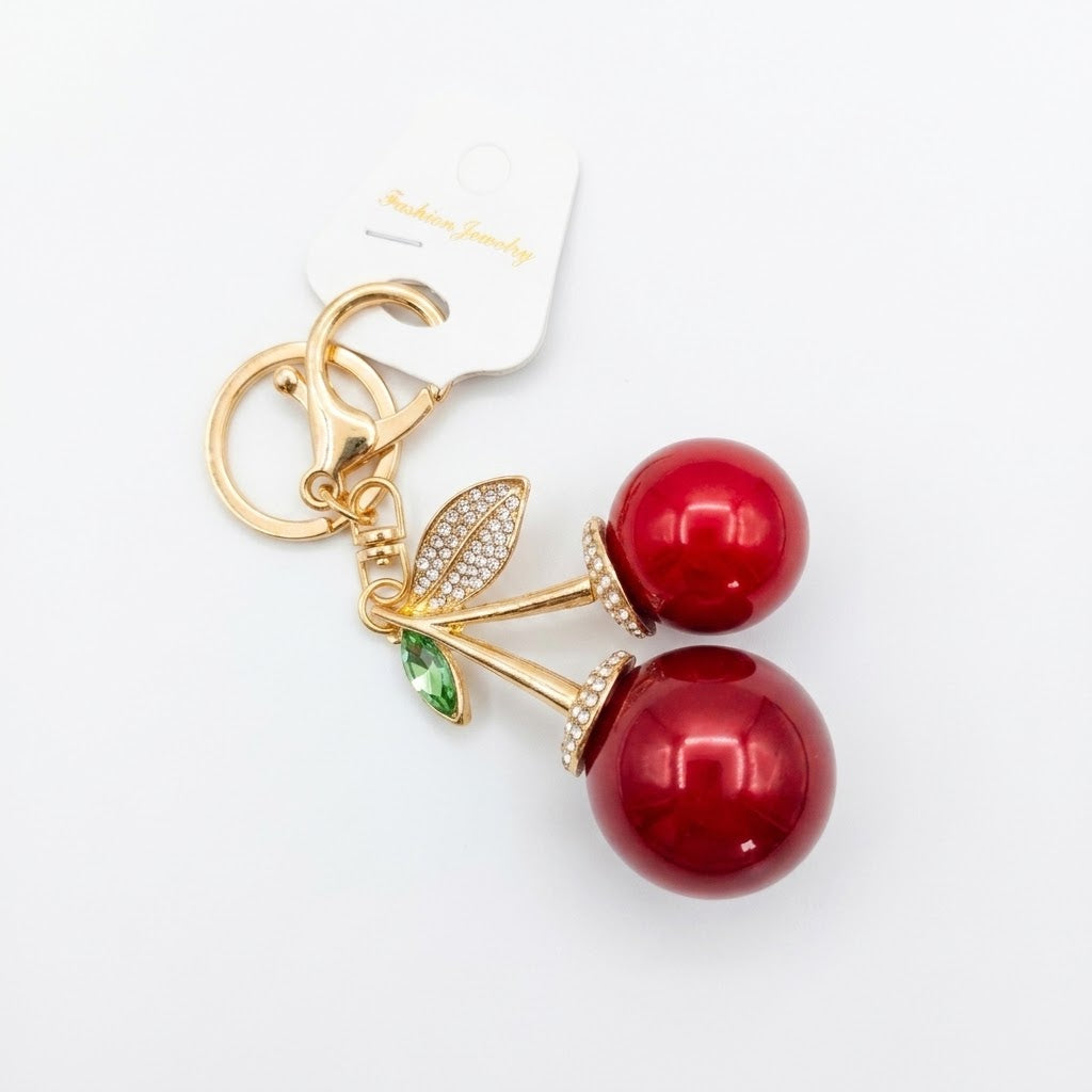Crystal-embellished fruit charms.