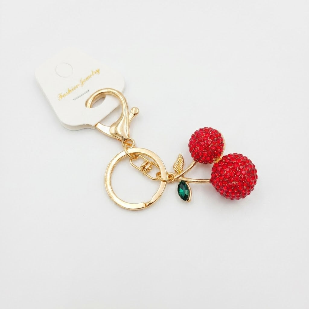 Crystal-embellished fruit charms.