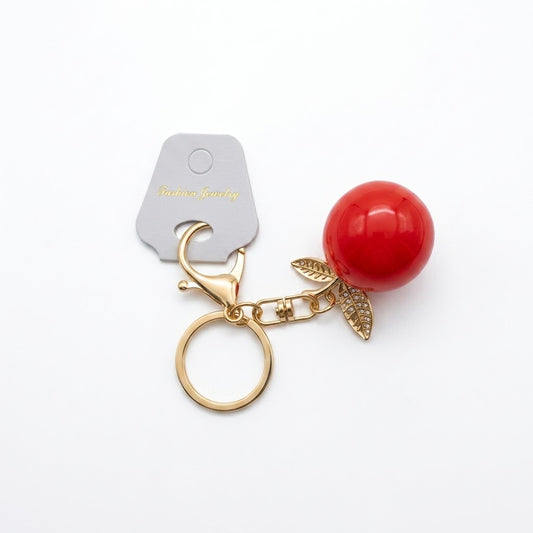Crystal-embellished fruit charms.